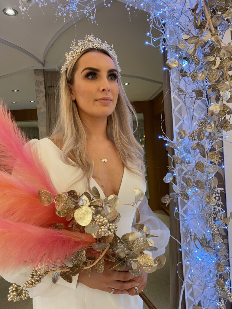 Model and Limelight bride, Kayleigh Barry, wears the Woodstock wedding dress 31143 by Adrianna Papell with the Larkspur Tiara for a romantic bridal statement at Limelight Occasions near Huddersfield, Wakefield and Leeds