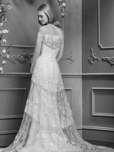 Ellis Bridals 12287 lace A line wedding dress with Bardot neckline and long sleeves back view.