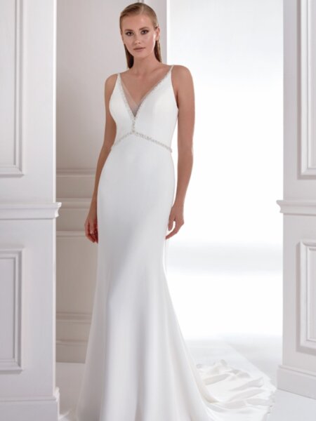 Libelle Leslie plain fitted V neck wedding dress with deaded detail at the empire line and low statement back front view.