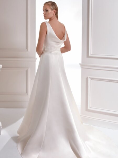 Libelle Lucinda satin A line wedding dress with high neckline and statement cowel back full length back view.
