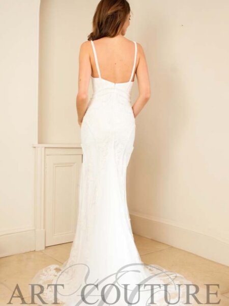 Art Couture vintage style fitted wedding dress with short train back view.