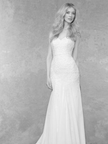 Ellis Bridals 15180 relaxed mermeaid wedding dress with lace bodice close up front view.
