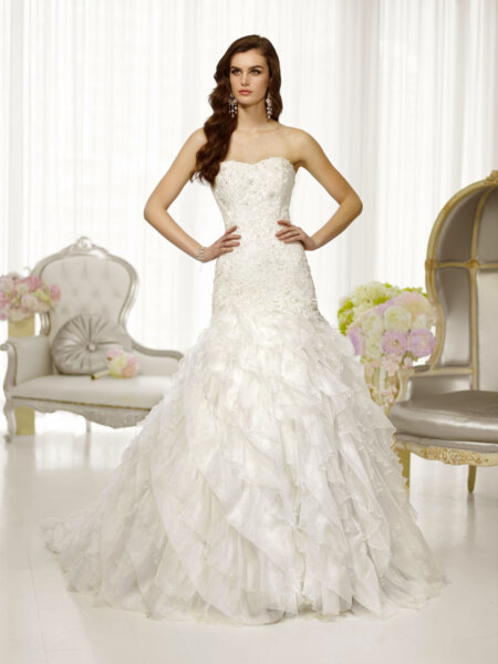 Essense of Australia D1559 mermaid wedding dress with beaded lace bodice and waterfall skirt front view.