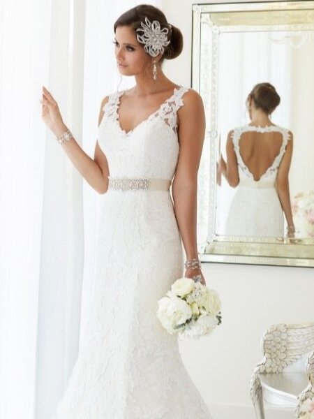 Essense of Australia D1695 v neck fitted lace wedding dress with heart shaped peep hole back front view with back reflection.
