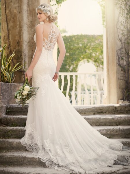 Essense of Australia D1910 fitted lace wedding dress with waterfall skirt with illusion back and long train back view.