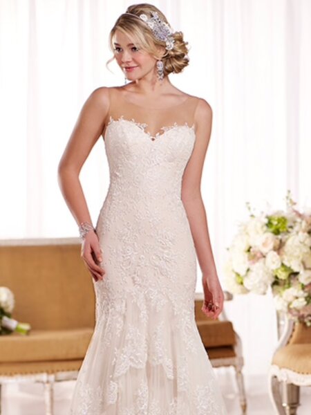 Essense of Australia D1910 fitted lace wedding dress with illusion neckline waterfall skirt front view.