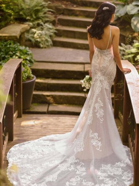 Essense of Australia D2887 fitted lace wedding dress with low back and statement train back view.
