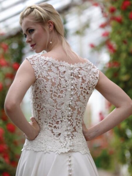 Nicola Anne Latin plain A line wedding dress with detachable lace top back view.