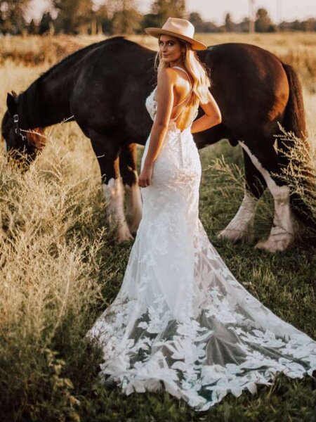 Essense of Australia D3240 fitted floral wedding dress with plunge neckline back with horse.