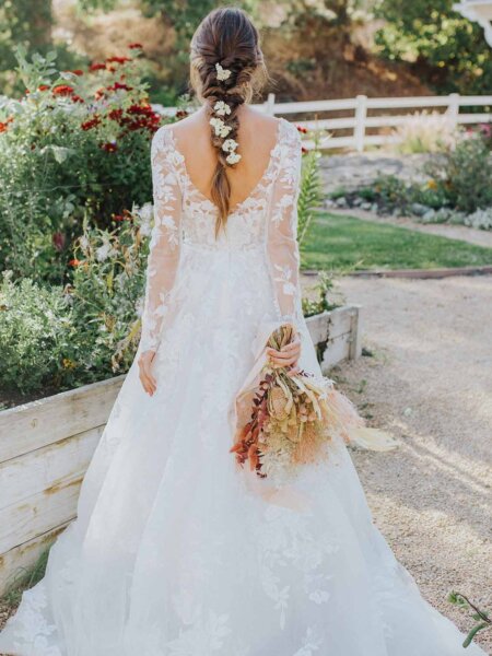 Essense of Australia D3358 V back ballgown wedding dress with long sleeves back view.