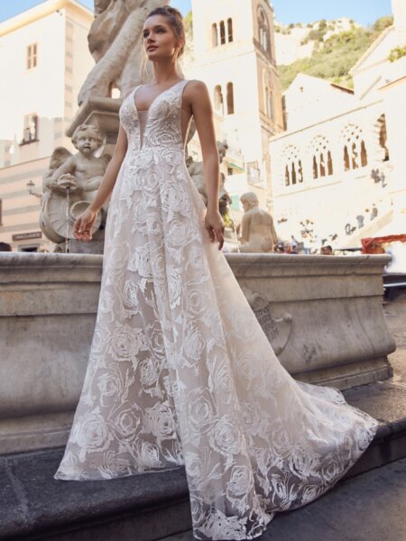 Libelle Metaponto Aline wedding dress with statement rose embroidered tulle with V neck front.
