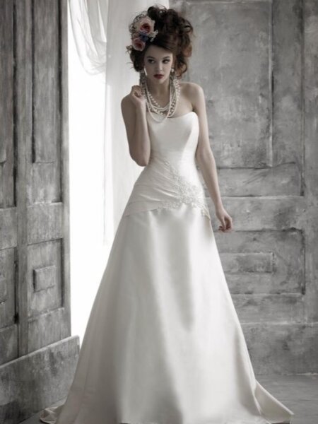 Nicola Anne Delightful A line wedding dress with corset bodice for a dramatic hourglass silhouette front view.