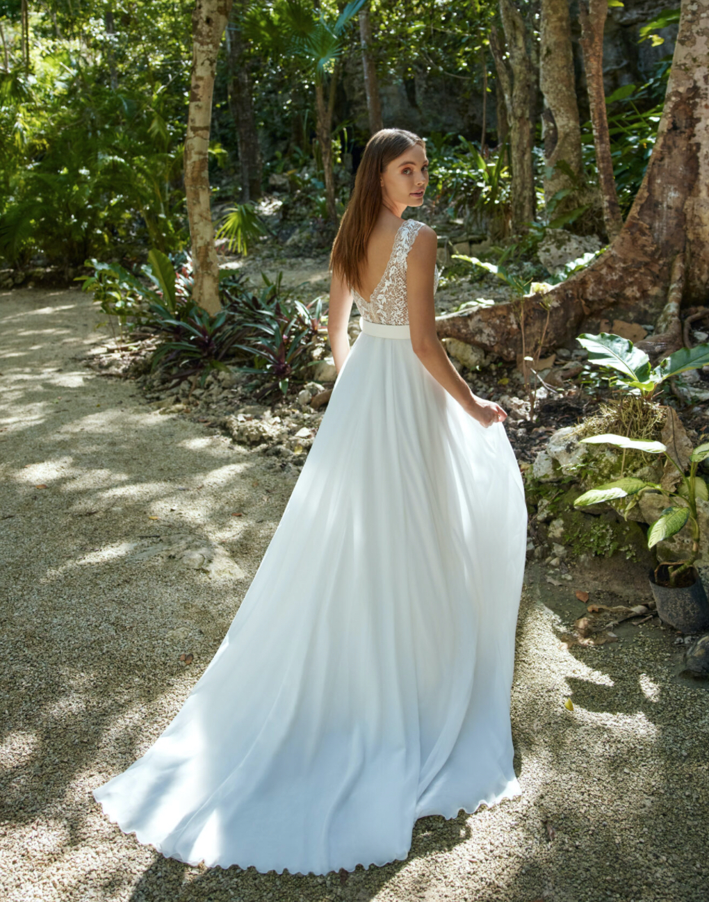 Libelle Hadid wedding dress with V neck lace bodice and chiffon A line skirt back.
