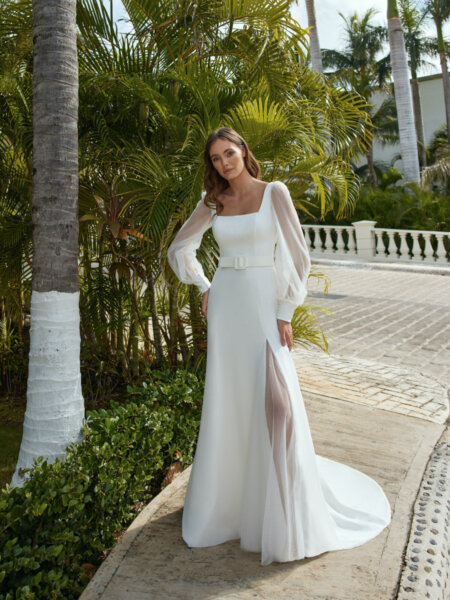 Libelle Bridal Harley slim A line Wedding dress with square neckline, floaty sleeves and leg reveal front.