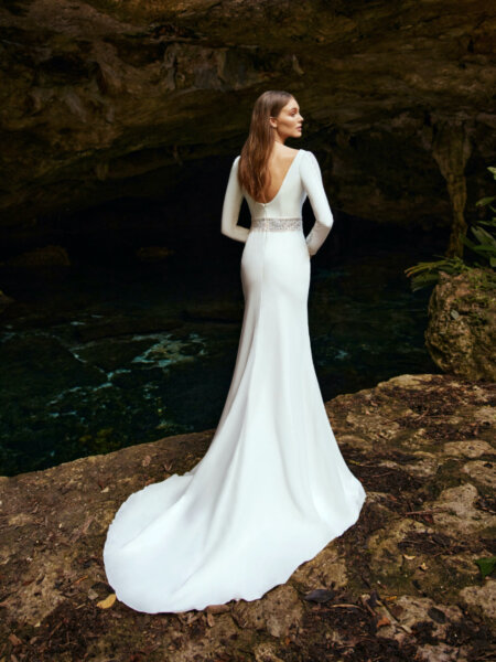 Libelle Bridal Henley fitted wedding dress with high neck and long sleeves with inset lace detail back.