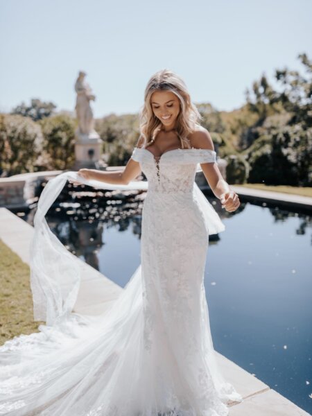 Essense of Australia D3639 off the shoulder fitted wedding dress with detachable shoulders and train.