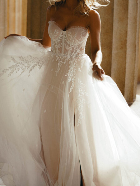 Essense of Australia D3787 ultra romantic A line wedding dress with boned sweetheart bodice and leaf lace detail front view.