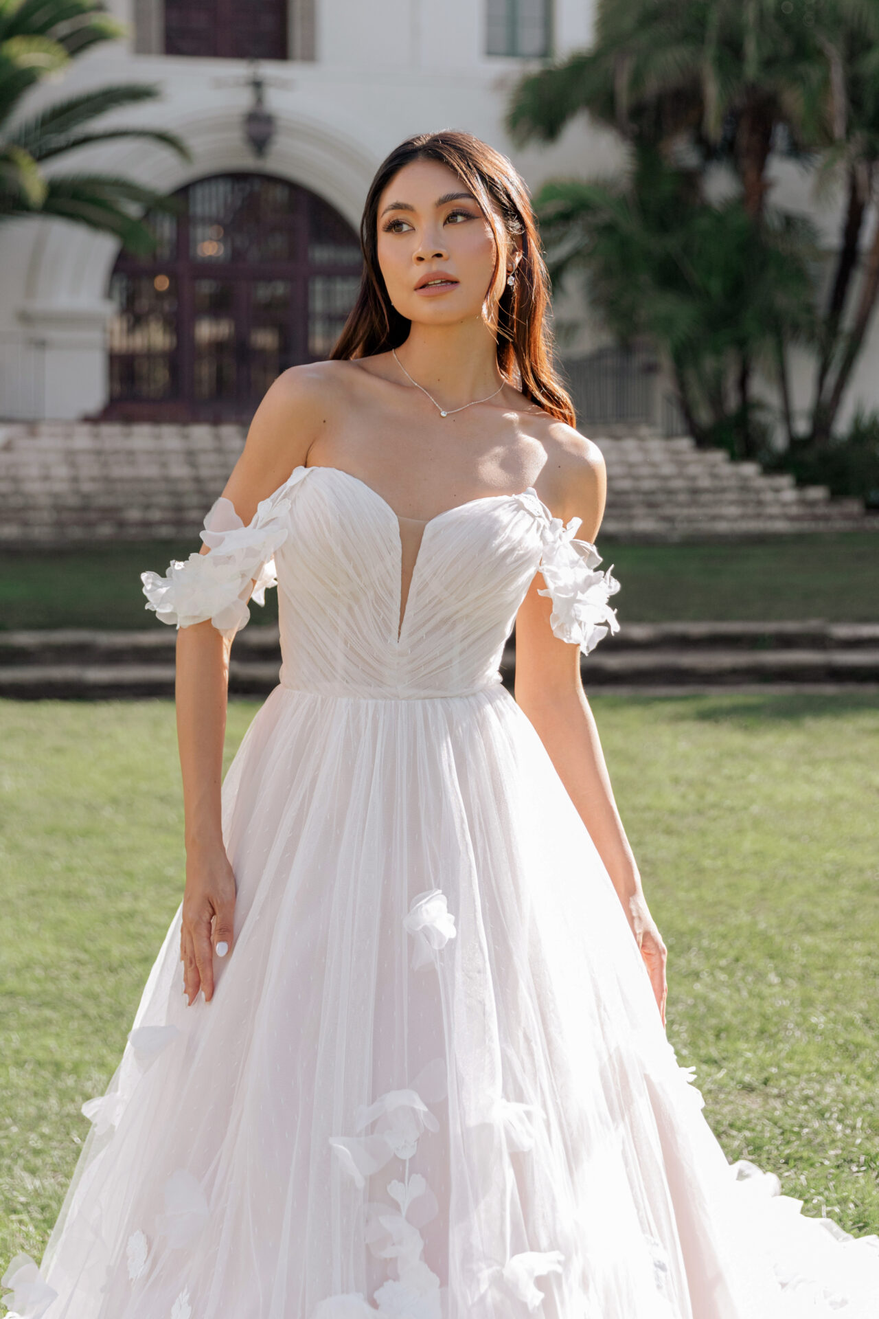 Essense of Australia D3734 romantic ballgown wedding dress with three dimensional flower detail close up front view.