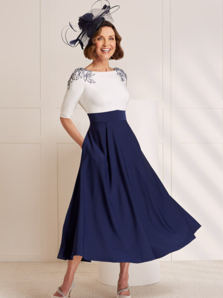 John Charles 28013 Mother of the Bride dress with high waistline and navy swing skirt with ivory bodice and navy shoulder detail also perfect for the races.