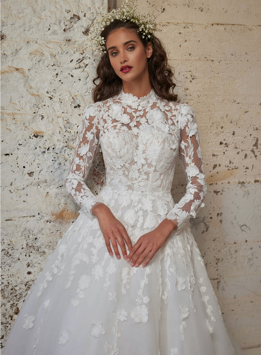 Calla Blanche Alessandra 123248 full lace high wedding dress with long sleeves keyhole back and ballgown skirt close up front view.