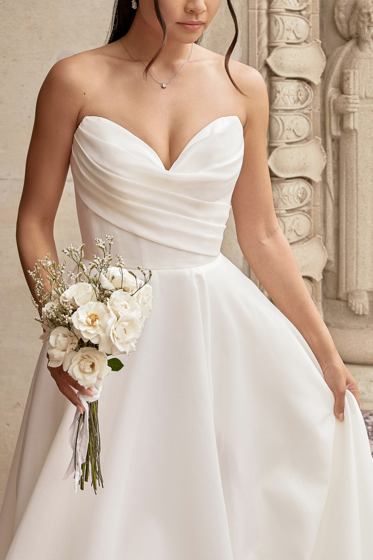 Essense of Australia D3941 strapless floaty ballgown wedding dress ultra romantic close up front view.