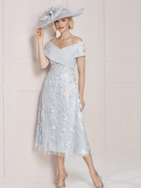 John Charles 66529 mother of the bride A line dress in pale blue floral lace and beaded Bardot neckline front view with hat.