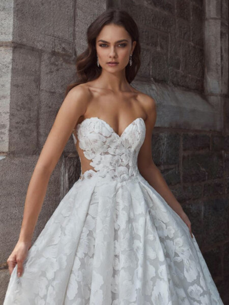 Calla Blanche Callista 124126 full floral lace ballgown with sweetheart neckline and translucent side panels.