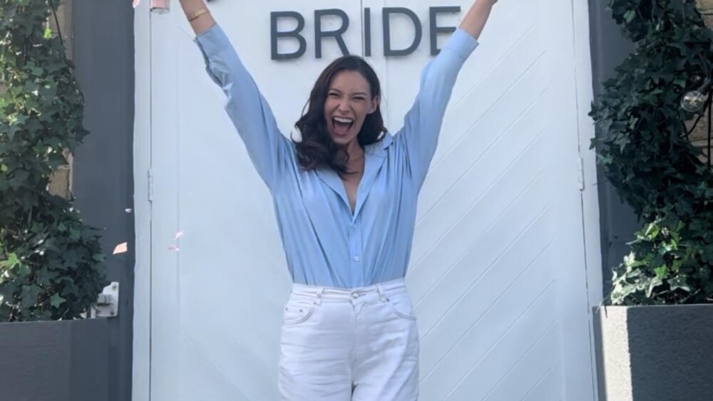 Autumn Palmer social media influencer celebrating finding her wedding dress at Limelight Occasions yorkshire hidden gem wedding dress shop