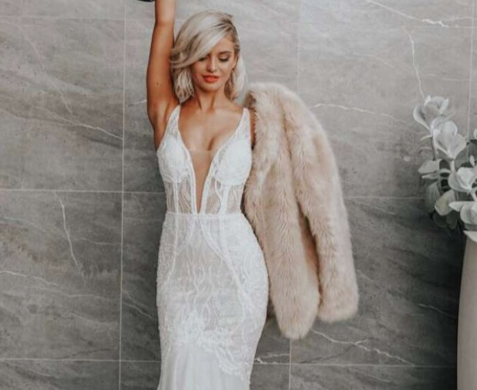 Sale wedding dress fitted lace wih plunge V neckline front.