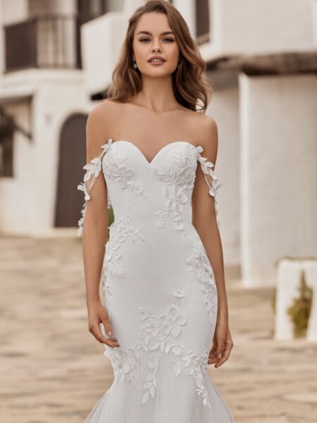 Enzoani Love Dixie fitted wedding dress with plain bodice statement 3d lace embellishment and tulle mermaid skirt close up front view available Huddersfield bridal boutique West Yorkshire.