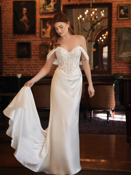 Essense of Australia D4303 fitted wedding dress with lace basque bodice plain satin skirt and off the shoulder detachable strap front view.