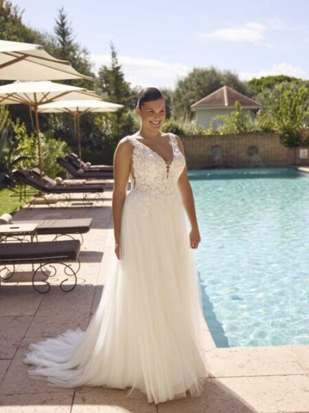 Modeca Curves Jada plus size wedding dress with plain a-line tulle skirt V neck lace bodice and detachable flutter sleeves removed front view.