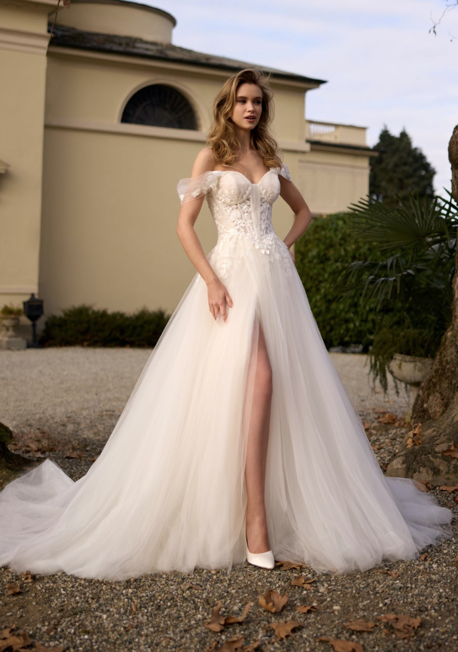 Randy Fenoli Juliet A-line Wedding Dress in tulle with pretty lace detail cascading onto the plain skirt with drop straps the ultimate in bridal romance front view.