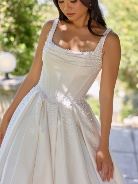 Essense of Australia D4418 ballgown wedding dress with square neckline pearl beaded basque bodice and low square back close up front view.
