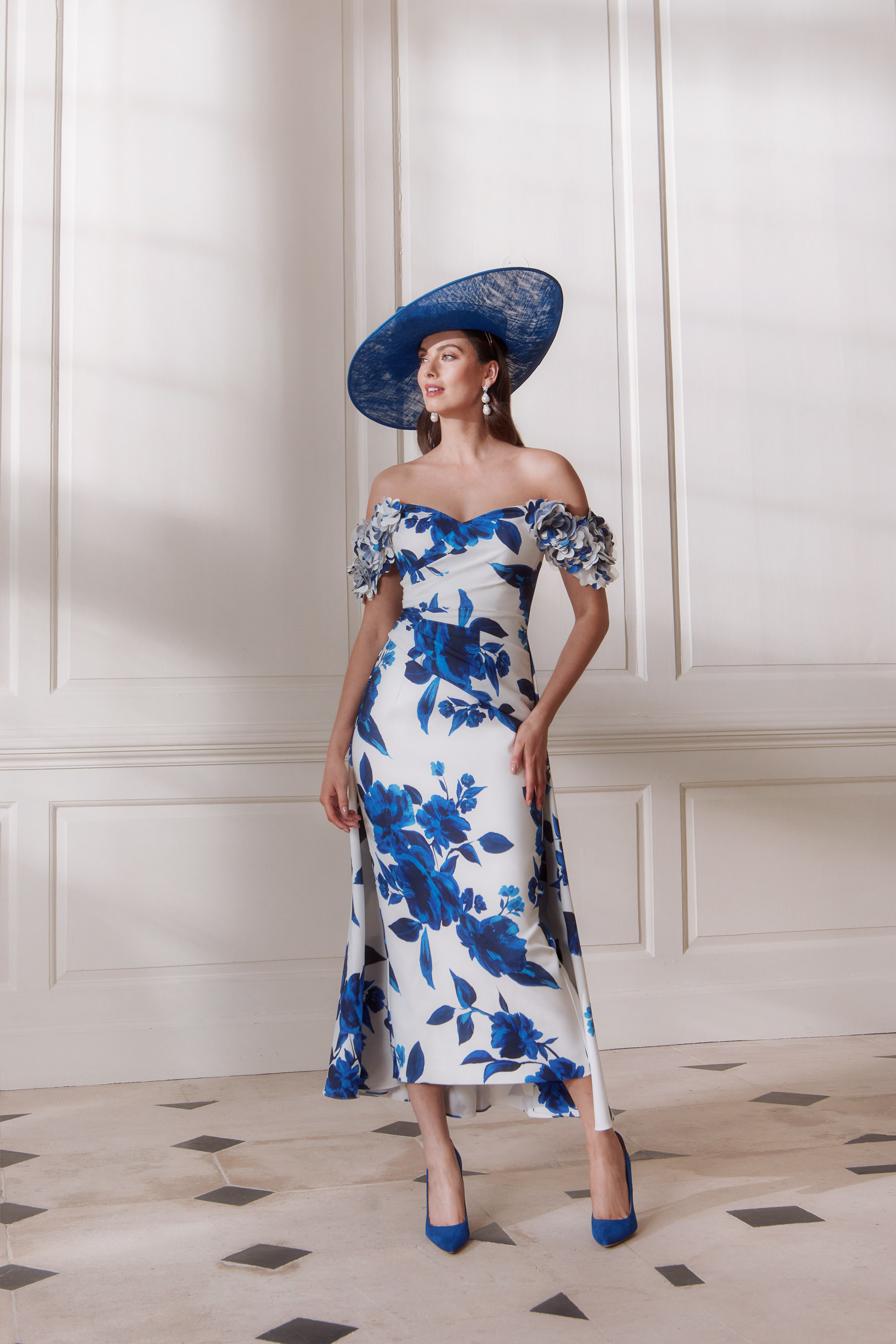 John Charles 66732 fitted mother of the bride dress in blue and ivory floral with overskirt and off the shoulder neckline with video.