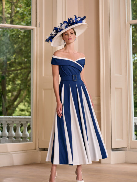 John Charles 29204 Mother of Bride in navy and ivory with off the shoulder neckline and full skirt with belted waistline occasion wear for weddings, ladies days at the races, cruises and black tie events.