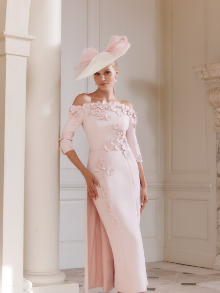John Charles 29318 petal-pink mother of the bride dress off the shoulder fitted with overskirt and 3D floral detailModern occasion wear West Yorkshire bridal boutique near Huddersfield and Wakefield.