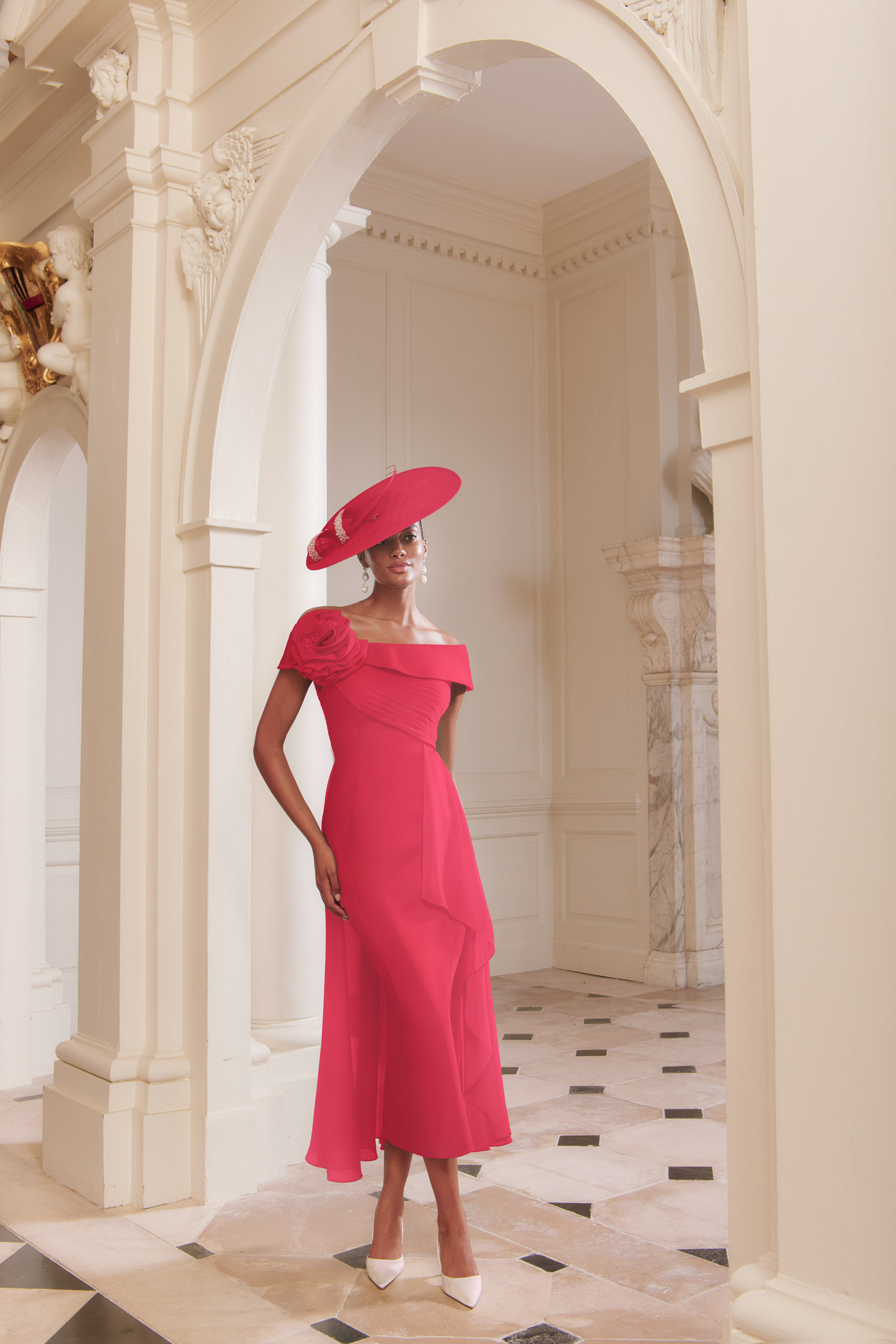 John Charles 66719B fitted mother of the Bride dress in hot pink crepe with chiffon overskirtElegant, modern and sophisticated occasion wear for weddings, the races, cruises and black tie events with front view with video