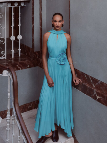 Maisonel 3151 modern mother of the bride dress in aqua chiffon with high neckline and elegant neck drapes front view.