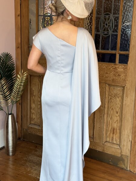 Maisonel 3075 pastel blue full length mother of the bride dress with asymmetric capeModern, elegant occasion wear for weddings, the races, cruises and black tie events back view. Matching hats, shoes and bags available.