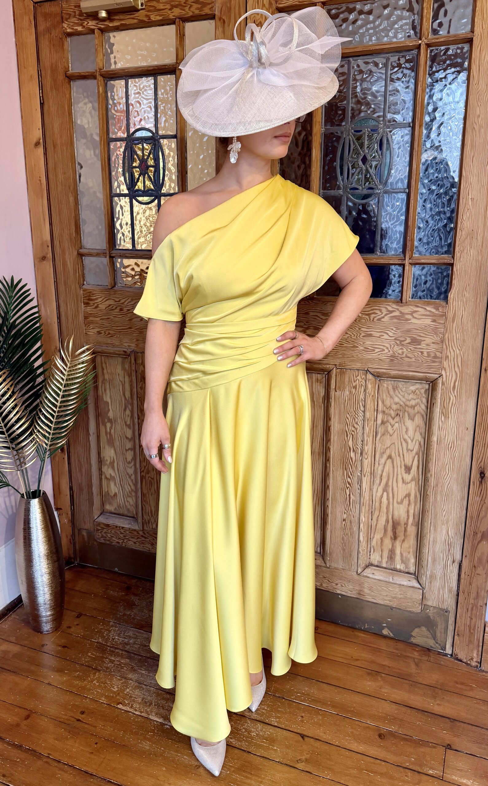 Maisonel 3138 A line mother of the bride dress in plain sunshine lemon with A symmetric necklineModern, elegant occasion wear for weddings, the races, cruises and black tie events front view with video. Matching hats, shoes and bags available. 