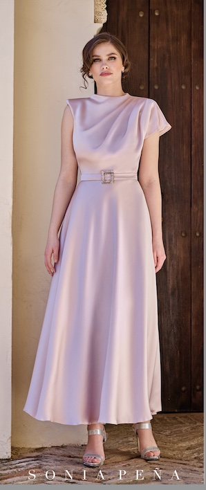 Sonia Penna 1260010 mother of the bride dress in a pretty pale pink with high neck and A line skirt.Modern occasion wear for weddings, the races, cruises and black tie events. Matching hats, shoes and bags available west Yorkshire bridal boutique near Huddersfield.