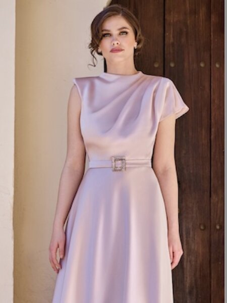 Sonia Penna 1260010 mother of the bride dress in a pretty pale pink with high neck and A line skirt.Modern occasion wear for weddings, the races, cruises and black tie events. Matching hats, shoes and bags available west Yorkshire bridal boutique near Huddersfield.