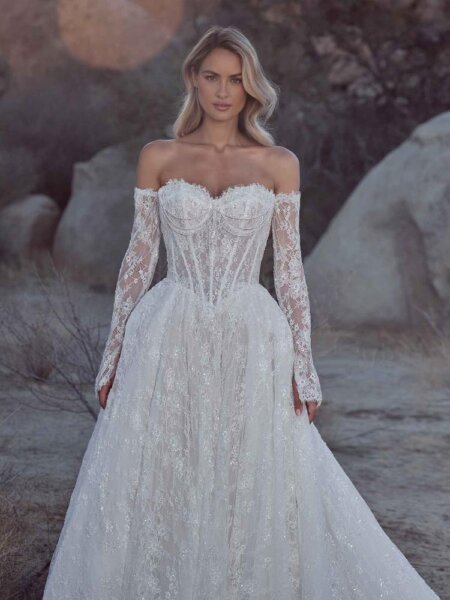 Calla Blanche 126105 Bianca wedding dress sparkly lace ball gown with basque bodice and optional long sleeves close up front view Huddersfield Bridal boutique West Yorkshire.