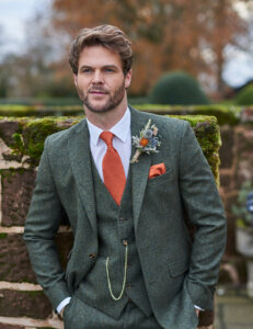 Peter Posh Oakmere green wedding suit with tie and hankies in a range of colours for grooms for sale or hire at our Huddersfield boutique Yorkshire.
