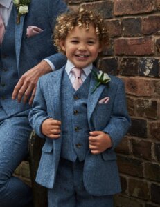Peter Posh Brocton blue tweed wedding suit with waistcoats ties and hankies in a range of colours for grooms men and boys for sale or hire at our Huddersfield boutique Yorkshire.