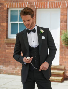 Peter Posh tuxedo grooms suit hire for black tie weddings at our Huddersfield boutique Yorkshire.