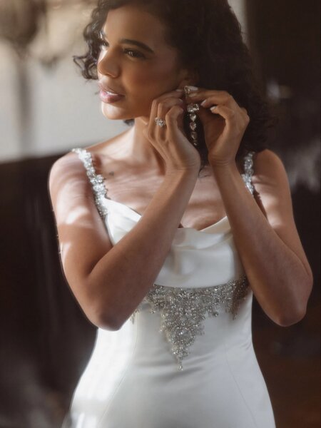 Essense of Australia D4609 fitted plain wedding dress with statement sparkle front close up view the perfect bridal gown for a black tie wedding.