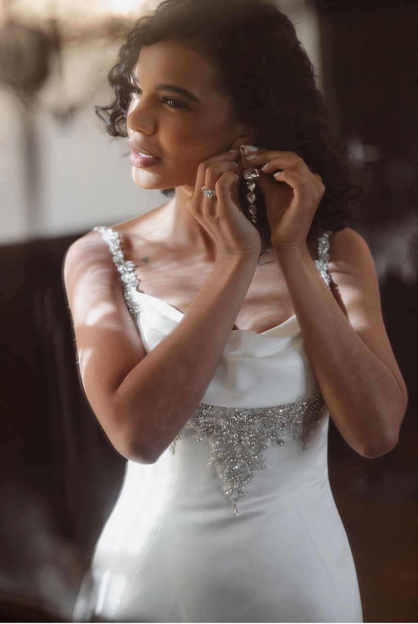 Essense of Australia D4609 fitted plain wedding dress with statement sparkle front close up view the perfect bridal gown for a black tie wedding.