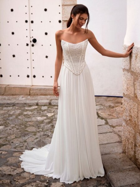 Enzoani Love Fenora B A line chiffon skirt with separate beaded corset lightweight and perfect for a wedding abroad front view.